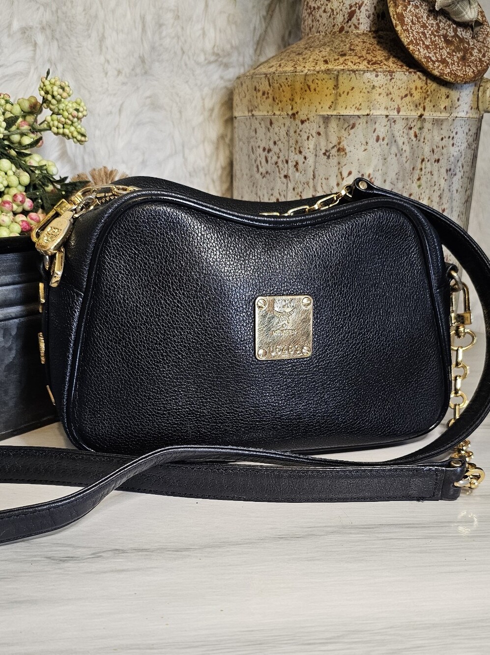 MCM Black Leather Crossbody with Gold Plaque